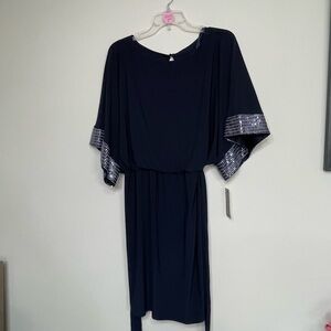 Jessica Howard Navy Dress with Silver Details
~ Size 10~ Special Occasion Dress